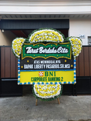 Papan Bunga Duka di Wame