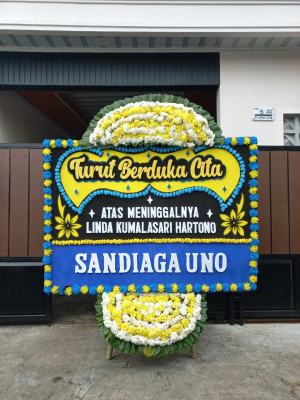 Papan Bunga Duka di Wame